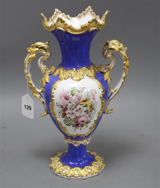 A Victorian porcelain vase, painted with panels of garden flowers, height 35cm